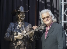 RICKY SKAGGS UNVEILS BILL MONROE BRONZE STATUE AT NASHVILLE’S RYMAN AUDITORIUM