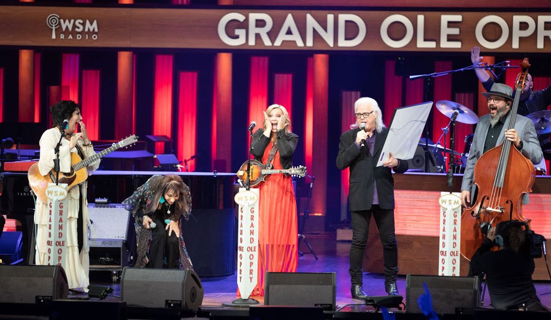 WATCH IT HERE–RICKY SKAGGS INVITES AWARD-WINNING GROUP THE ISAACS TO JOIN THE GRAND OLE OPRY!